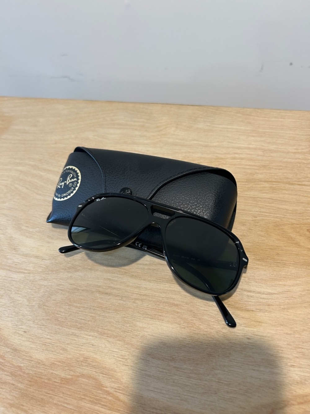 Ray-Ban Black Frame Sunglasses with Dark Lenses